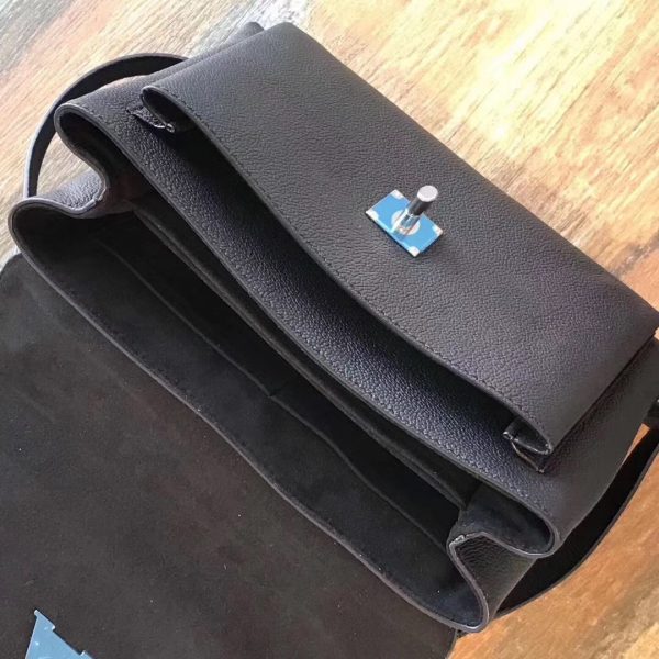 Styled lifestyle shot of chic modern women's handbag – women's designer-style accessory