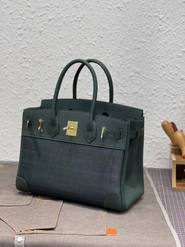 Side view of refined structured handbag