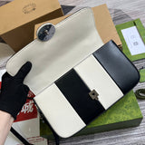 Styled lifestyle shot of refined statement women's handbag – women's premium purse