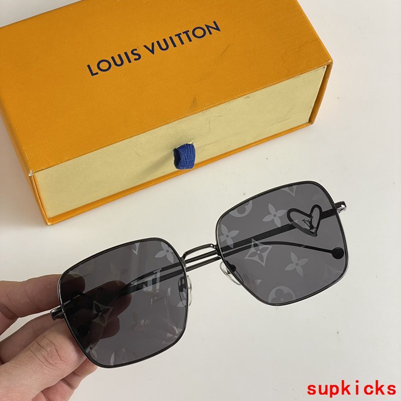 Close-up detail view of Louis Vuitton unisex sunglasses