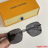 Close-up detail view of Louis Vuitton unisex sunglasses