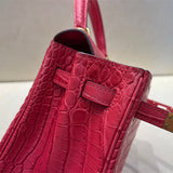 Side view of streamlined structured handbag