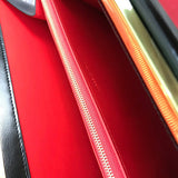 Side profile of premium polished women's handbag – women's designer-style accessory