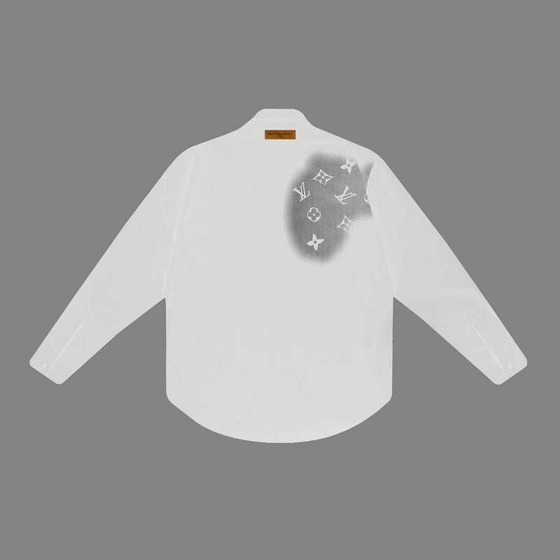 Close-up detail shot of Louis Vuitton luxury clothing with monogram-inspired silhouette