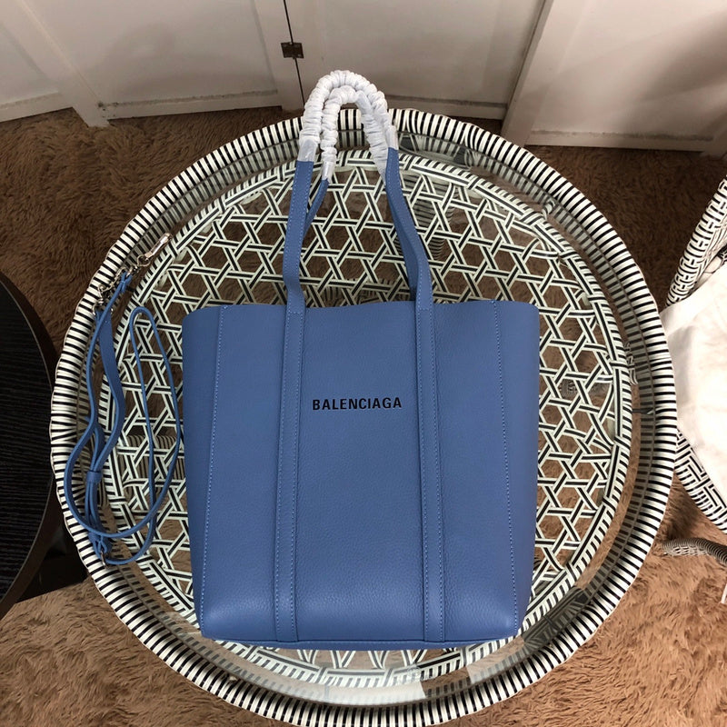 Front view of structured polished women's handbag – women's statement bag