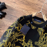 Side profile of Louis Vuitton luxury clothing with logo-detail design