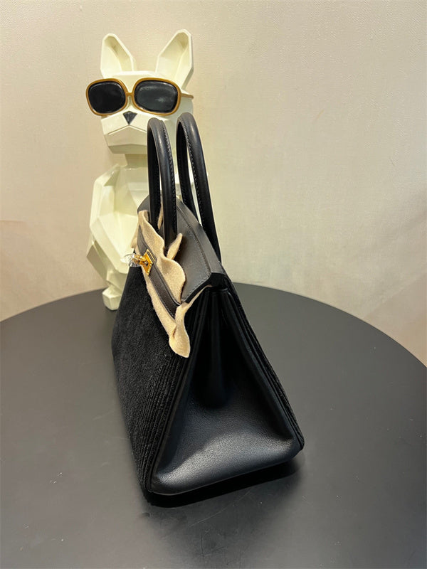  Timeless handbag carried on shoulder