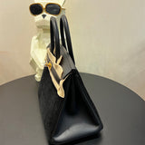  Timeless handbag carried on shoulder