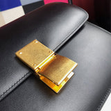 Back view of signature classic women's handbag – women's luxury accessory