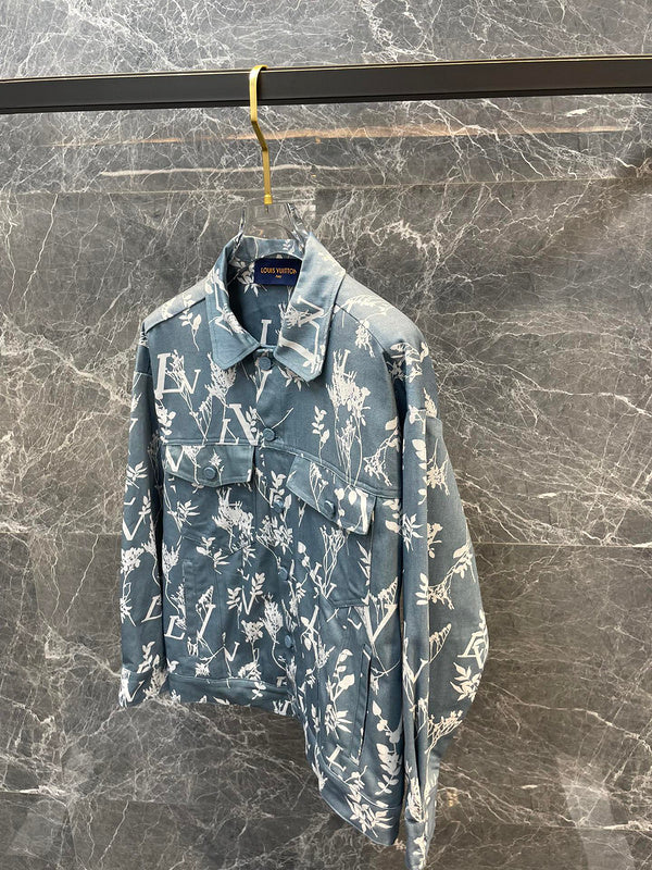 Close-up detail shot of Louis Vuitton luxury clothing with label-forward styling