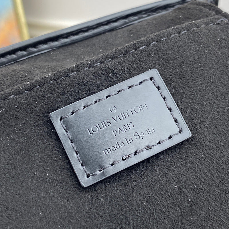 Side profile of refined elevated women's handbag – women's luxury accessory