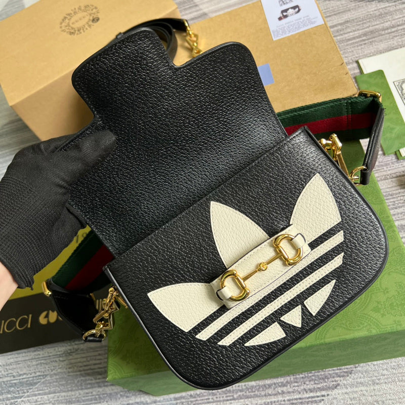 Handle and strap detail of structured statement women's handbag – women's statement bag