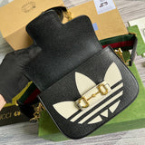 Handle and strap detail of structured statement women's handbag – women's statement bag