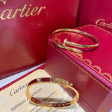 Close-up detail view of Cartier unisex jewelry piece