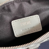 Side profile of sleek polished women's handbag – women's luxury accessory