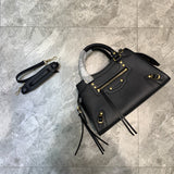 Timeless Premium PU Leather Handbag - Signature Hardware Accents | Women's Designer-Inspired Purse #677 - side angle view (image 2) of designer-inspired handbag