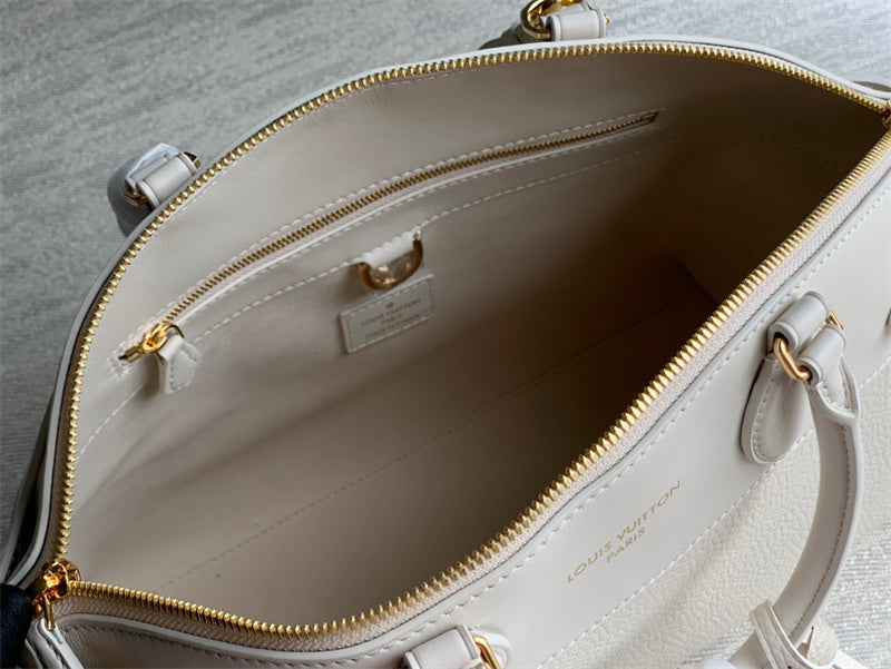  Polished top-handle bag carried on shoulder 28
