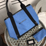 Handle and strap detail of elevated statement women's handbag – women's designer-style accessory