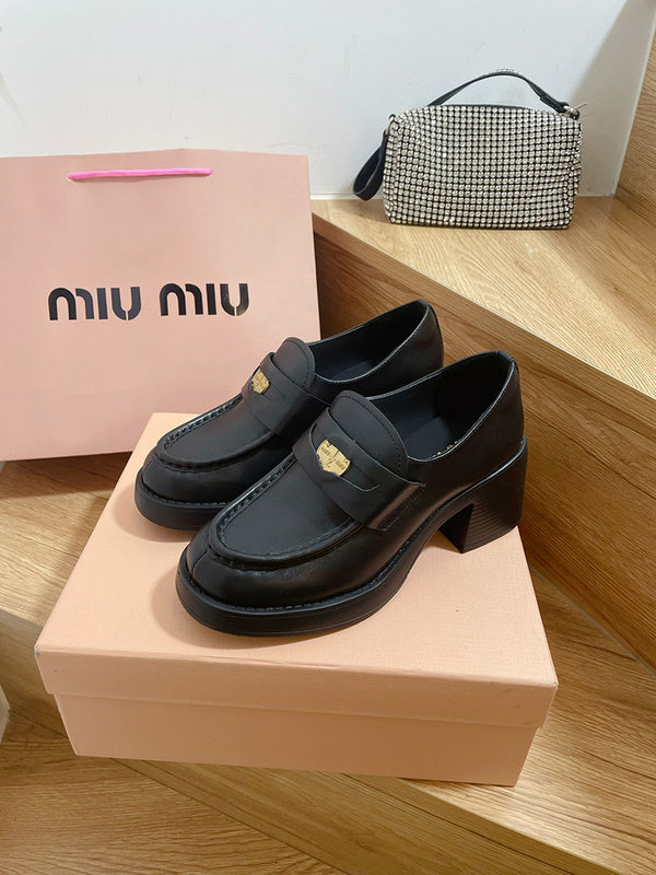 Three-quarter angle view of Miu Miu luxury piece style No.111