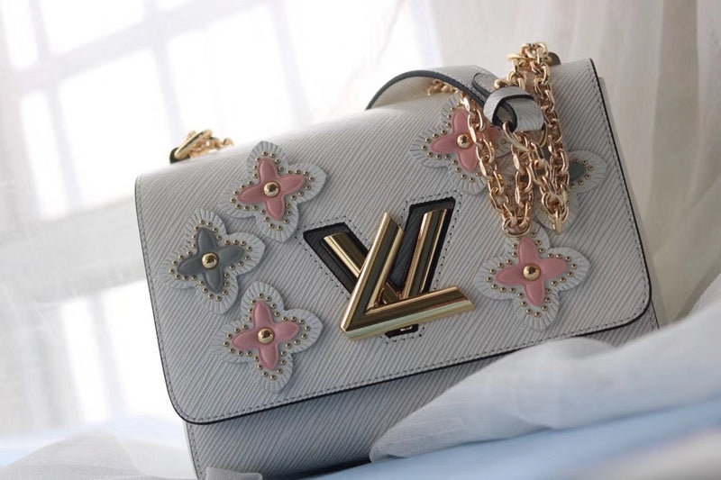 Handle and strap detail of refined modern women's handbag – women's luxury accessory