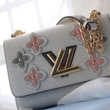 Handle and strap detail of refined modern women's handbag – women's luxury accessory