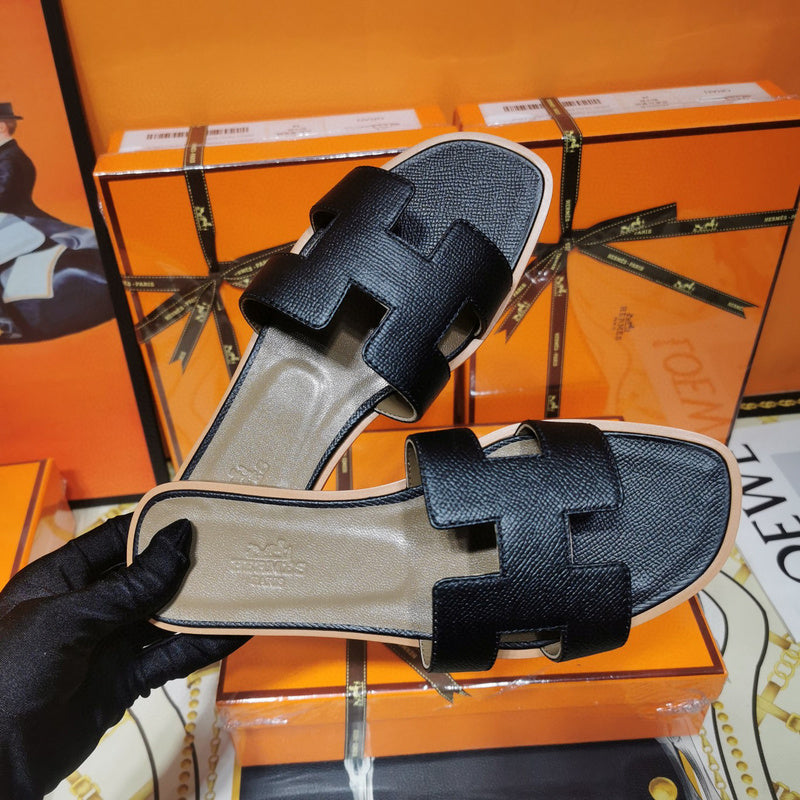 Hermes sandals Style 105 - close-up of iconic logo design
