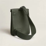 Side view of poised structured handbag