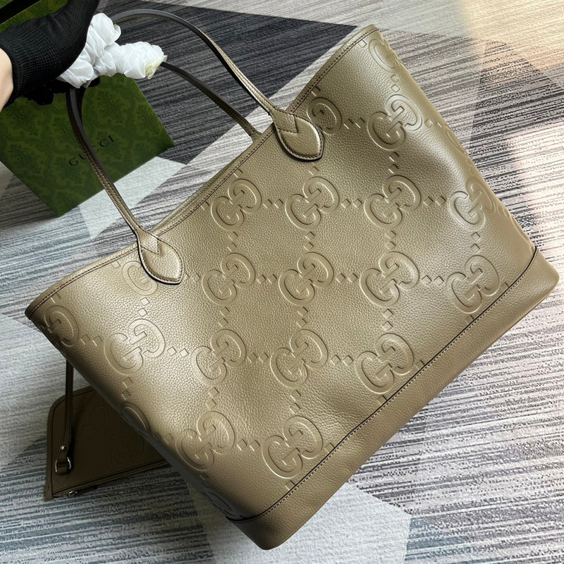 Handle and strap detail of signature elevated women's handbag – women's statement bag