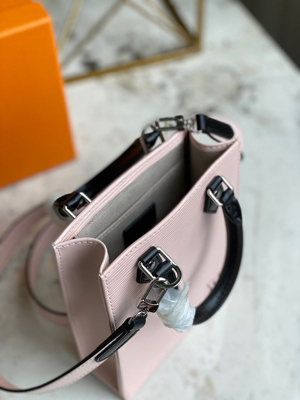 Front view of structured elevated women's handbag – women's statement bag