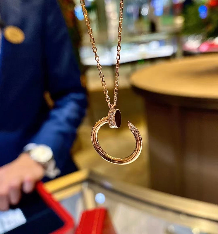Side view of Cartier unisex jewelry piece