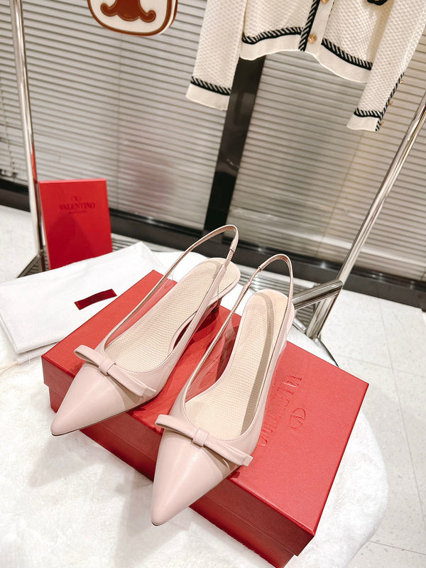 Side profile view of Valentino Garavani luxury piece style No.199