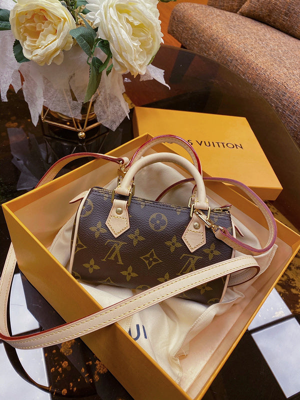 Side profile of chic sleek women's handbag – women's statement bag