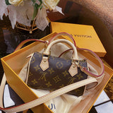 Side profile of chic sleek women's handbag – women's statement bag