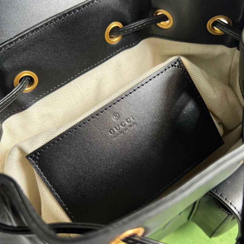 Side profile of signature statement women's handbag – women's designer-style accessory