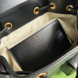 Side profile of signature statement women's handbag – women's designer-style accessory