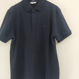 Close-up detail shot of Lacoste luxury clothing with signature branding