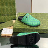 Side profile of Gucci all-black sneakers low-top design