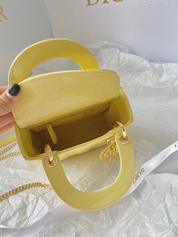 Styled lifestyle shot of structured signature women's handbag – women's designer-style accessory