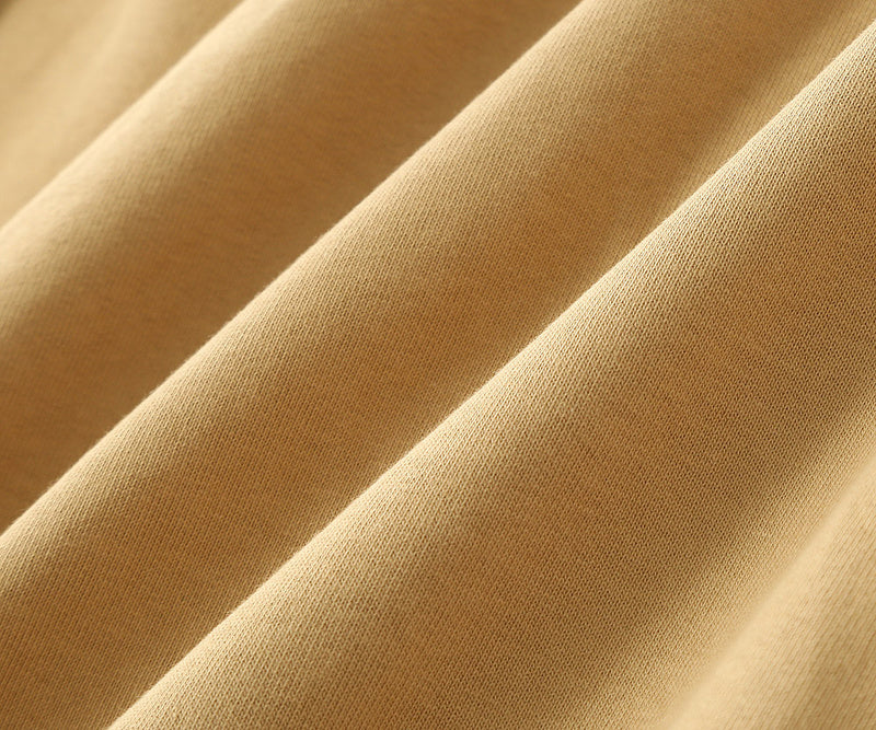 Side profile of Gucci luxury clothing with signature branding