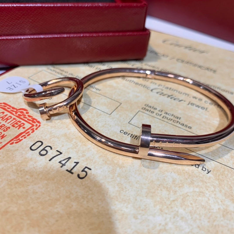 Close-up detail view of Cartier unisex jewelry piece