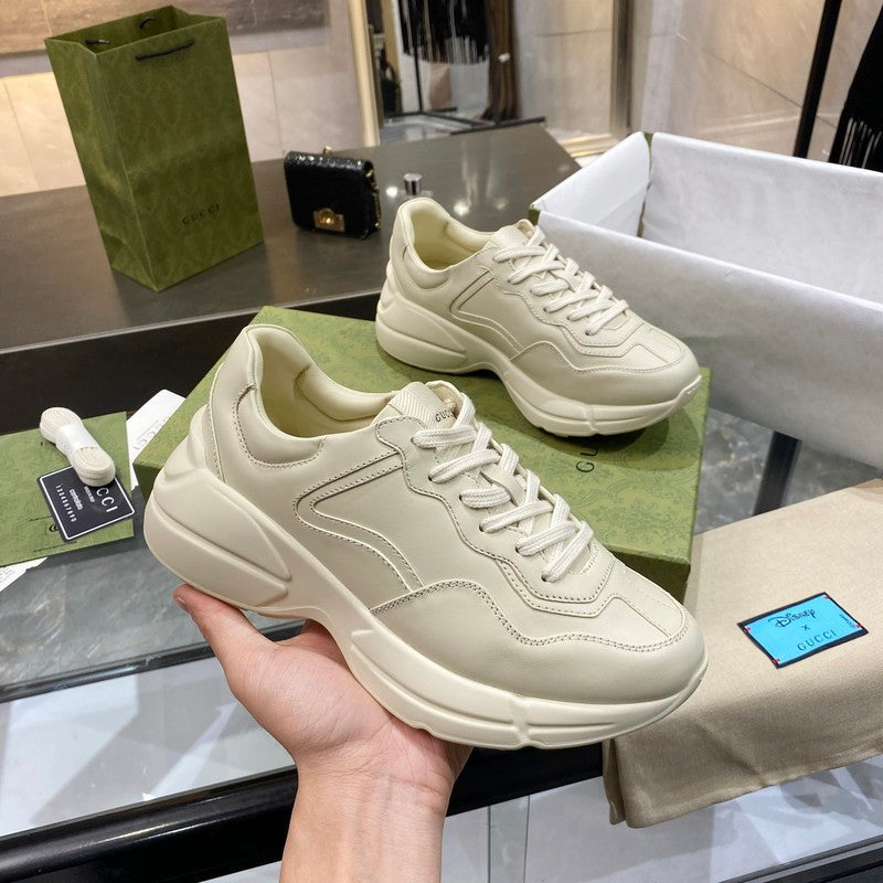 Side profile of Gucci two-tone sneakers breathable knit upper