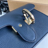 Styled lifestyle shot of elevated classic women's handbag – women's everyday handbag