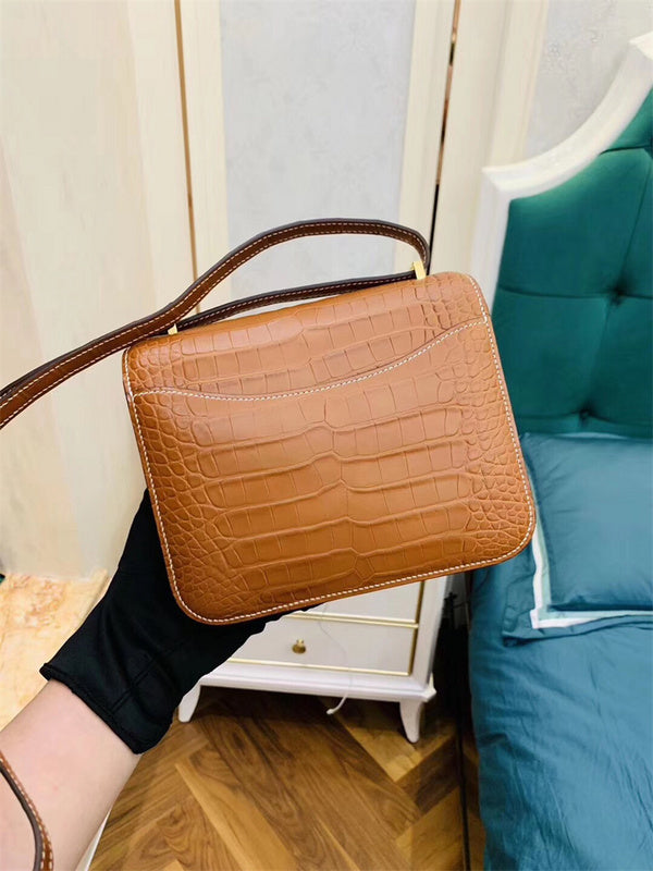 Side view of refined structured handbag