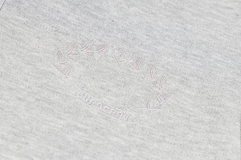Flat lay presentation of Polo cotton polo shirt with logo-detail design