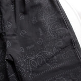 Close-up detail shot of Rhude luxury clothing with everyday silhouette