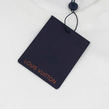 Full styled look of Louis Vuitton luxury clothing with label-forward styling