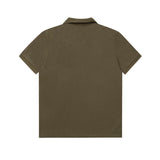 Close-up detail shot of Polo cotton polo shirt with monogram-inspired silhouette
