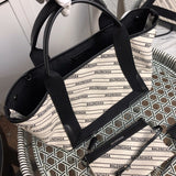 Styled lifestyle shot of refined classic women's handbag – women's premium purse