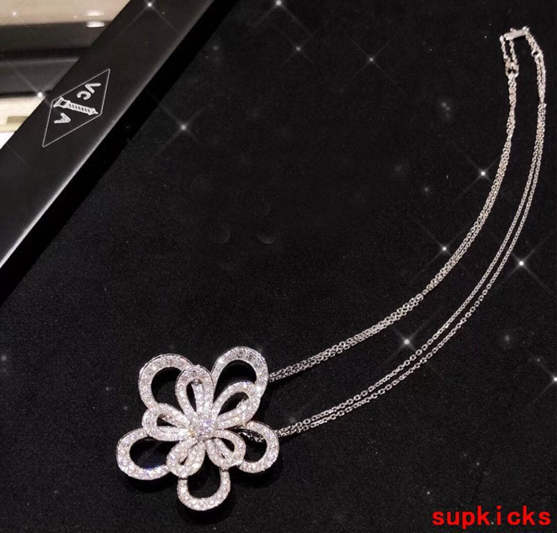 Lifestyle view of Van Cleef & Arpels unisex jewelry piece