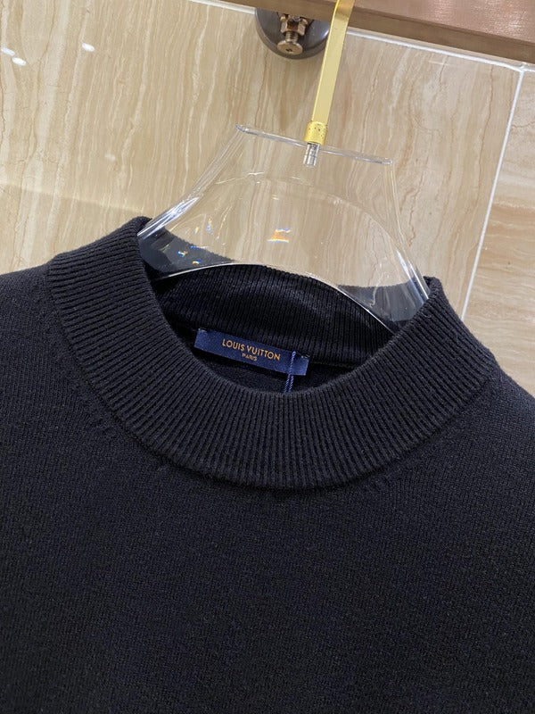 Back view of Louis Vuitton luxury clothing with streetwear-inspired cut